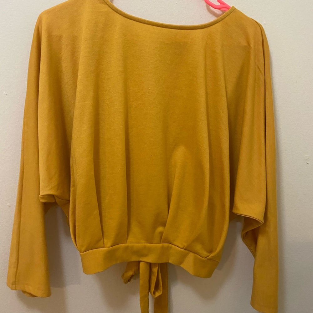 Yellow open back shirt